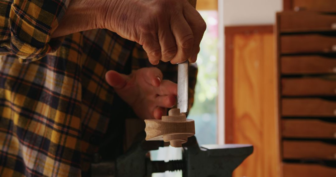 Senior Craftsman Carving Wood in Workshop - Free Images, Stock Photos and Pictures on Pikwizard.com