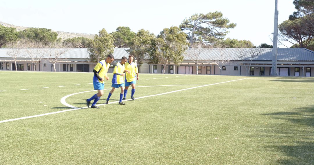 Soccer Players in Training Drills on Field in Uniform