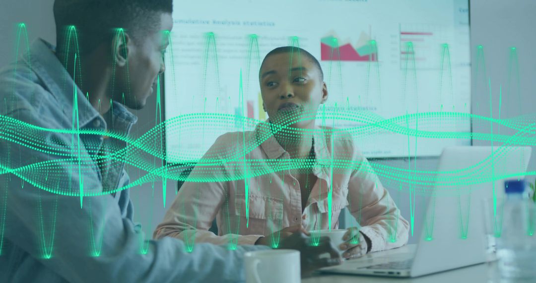 Diverse Team Collaborating on Data Analytics with Holographic Display