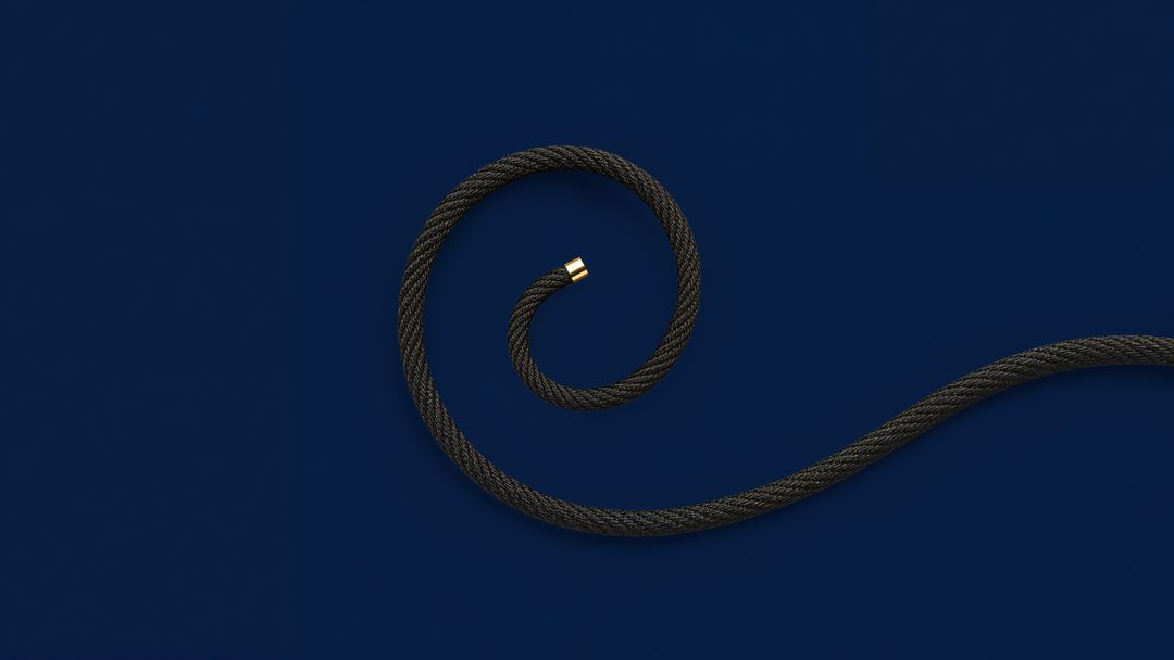 Coil of Braided Cable on Deep Navy Background