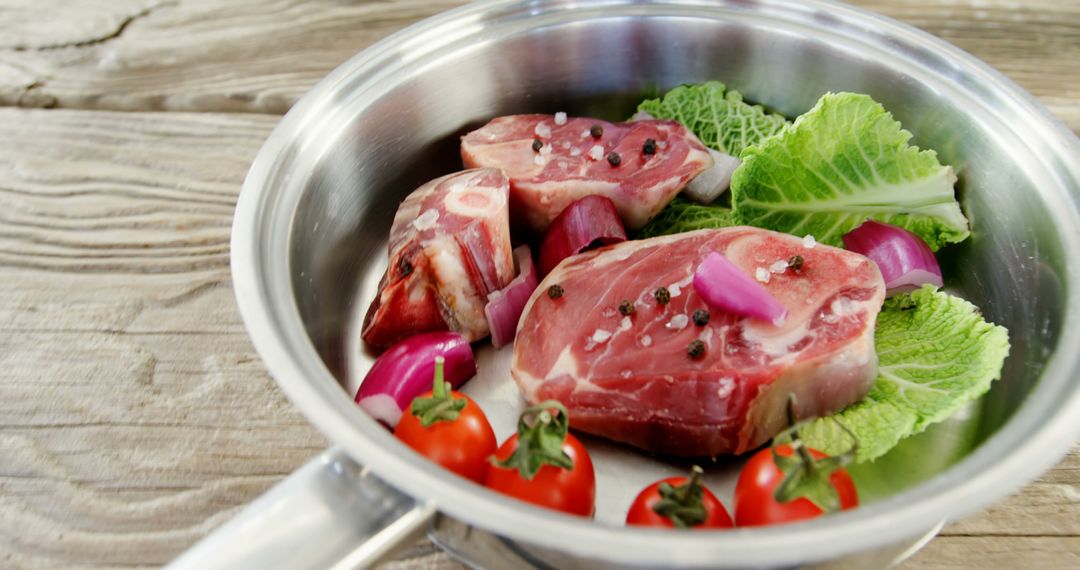 Raw Meat and Fresh Vegetables in Stainless Steel Cookware - Free Images, Stock Photos and Pictures on Pikwizard.com