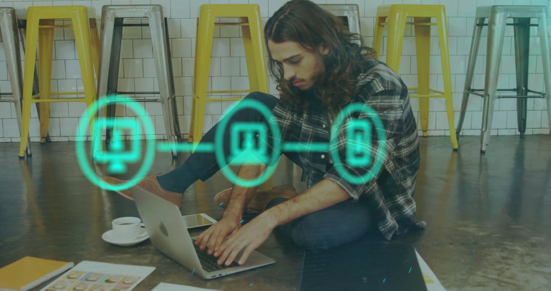 Young Man Engaging With Digital Network on Laptop