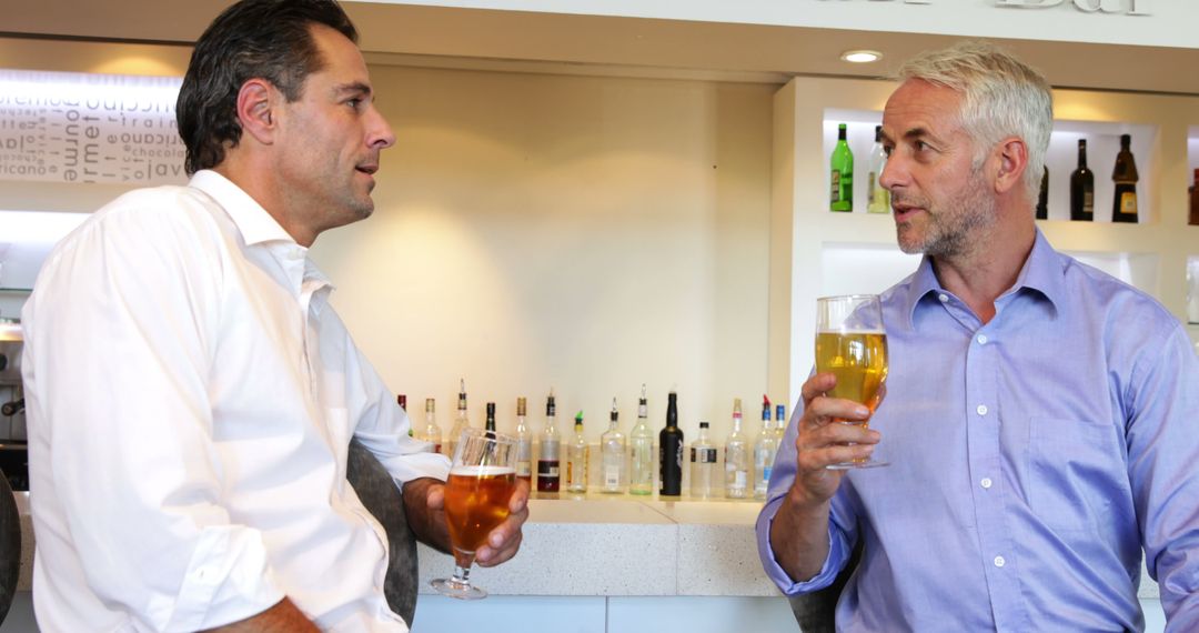 Friends Socializing at Local Bar with Drinks
