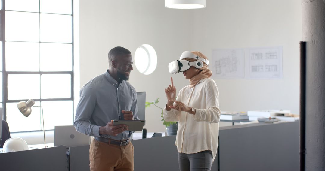 Woman Engaging in Virtual Reality Discussion with Colleague in Modern Office