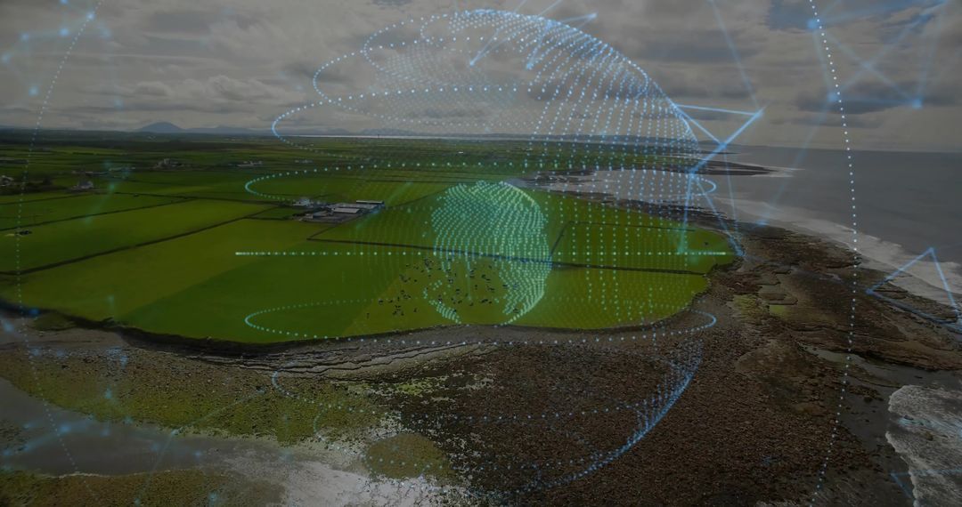 Holographic Mesh Globe Projecting Orbital Rings Over Coastal Farmland and Rocky Shoreline
