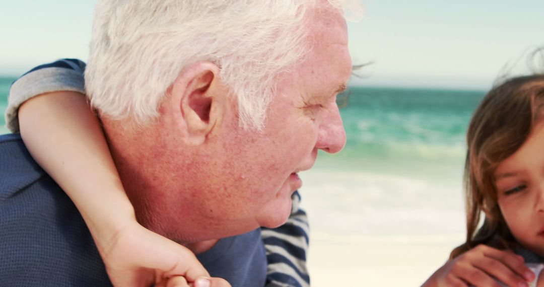 Grandfather Spending Quality Time at Beach with Grandchildren - Free Images, Stock Photos and Pictures on Pikwizard.com