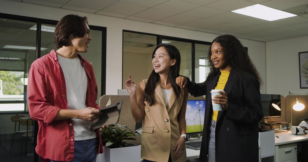 Diverse Team Engaging in Open Office Collaboration