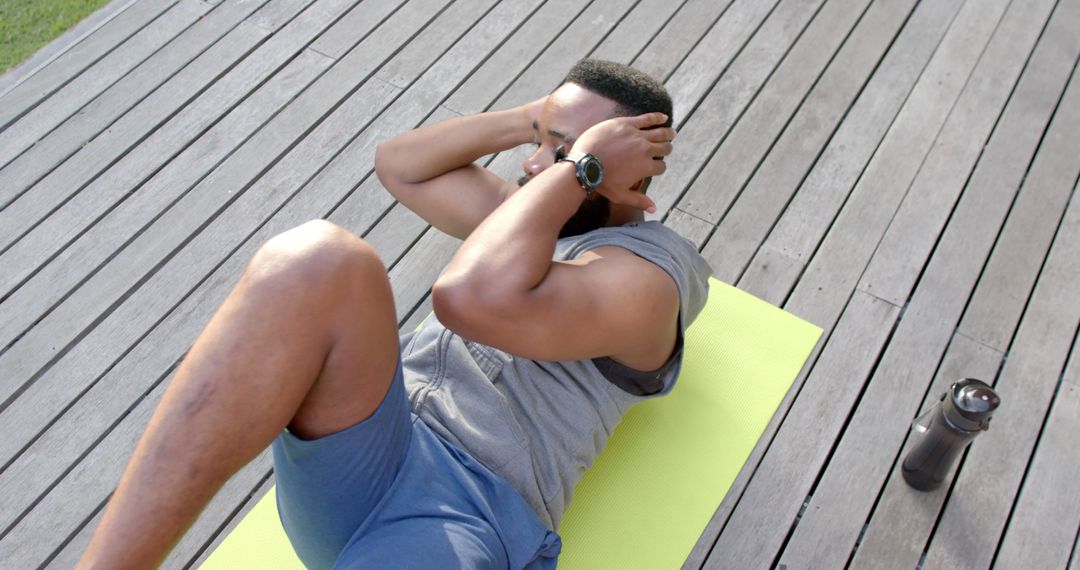 Man Exercising on Terrace with Fitness Equipment - Free Images, Stock Photos and Pictures on Pikwizard.com