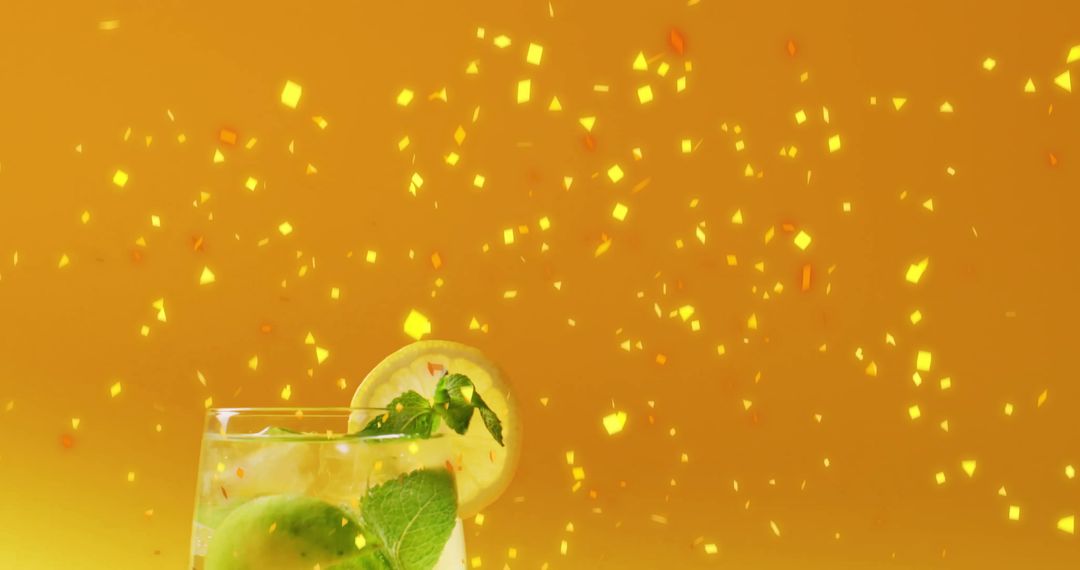 Refreshing Cocktail with Falling Confetti on Bright Yellow