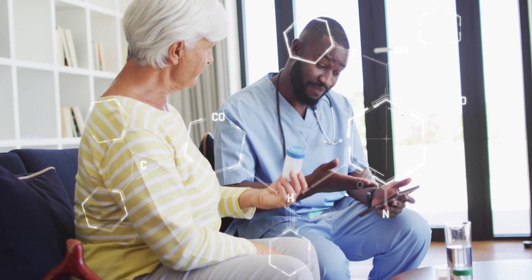 Nurse Discussing Medication with Senior Patient at Home