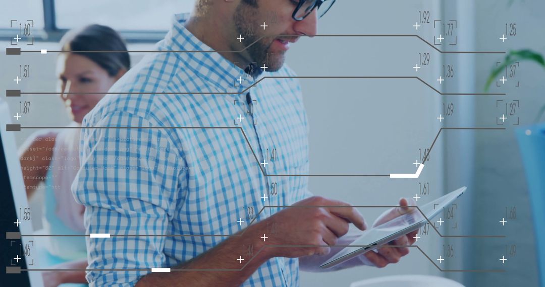 Business Team Analyzing Financial Data on Digital Tablet in Office