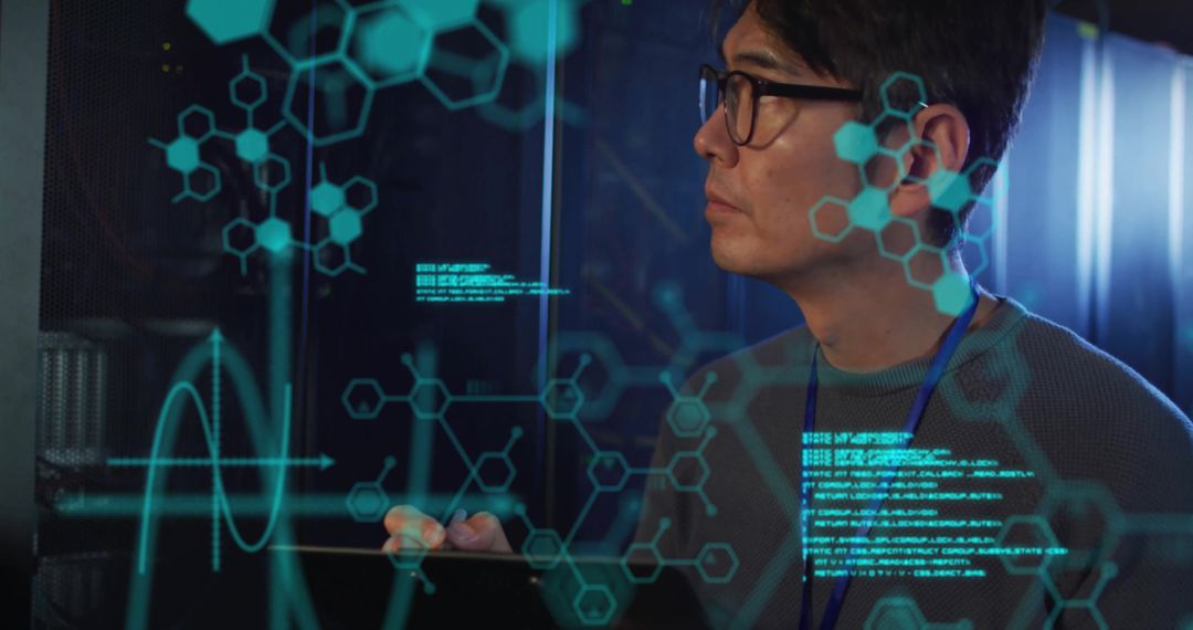 Asian Businessman Analyzing Data and Chemical Models in Server Room