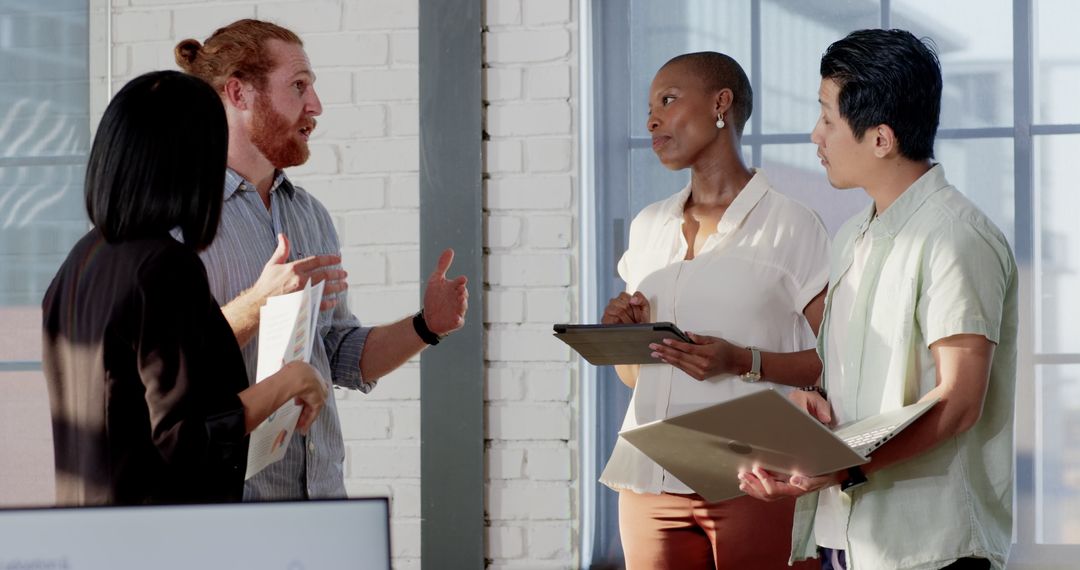 Diverse Team Brainstorming Project in Modern Office Setting