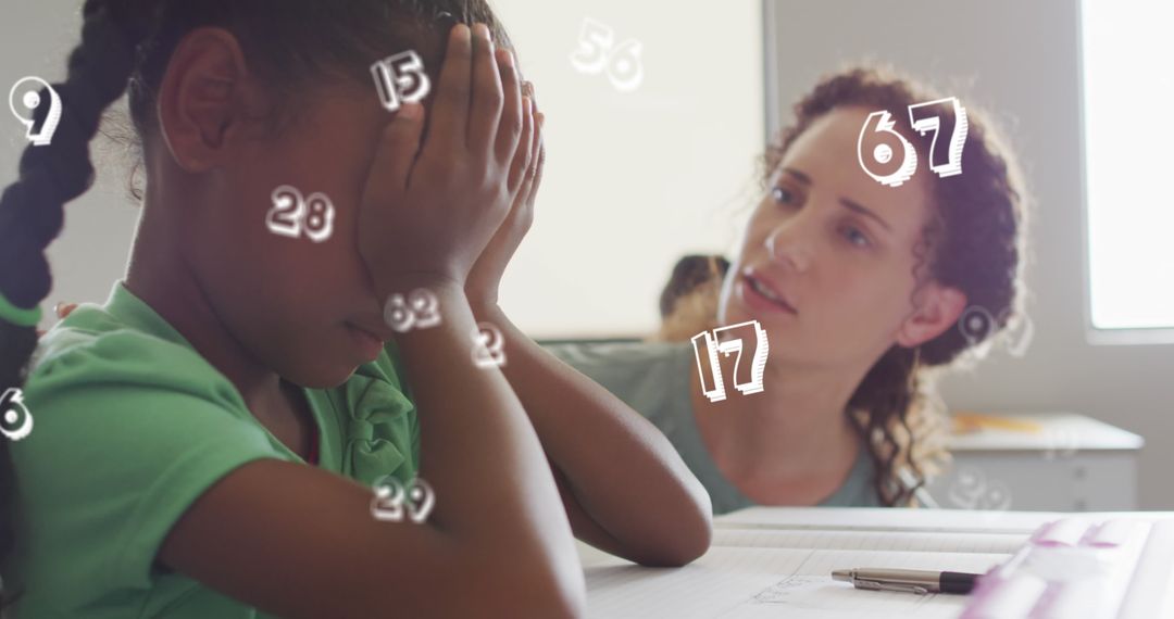 Supportive Teacher Comforting Upset Student in Classroom