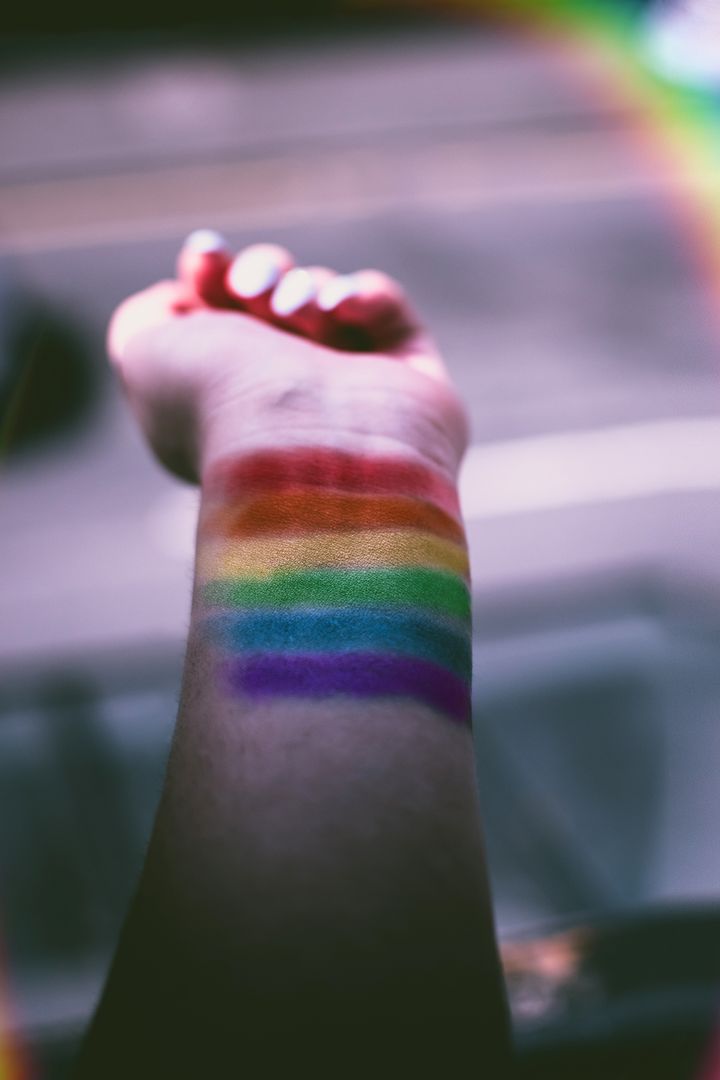 Rainbow Colors on Forearm Symbolizing Diversity and Inclusion
