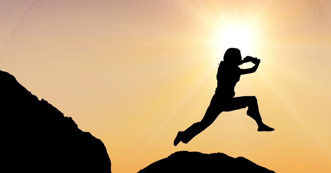 Silhouette of Business Person Leaping on Mountain at Sunset - Free Images, Stock Photos and Pictures on Pikwizard.com