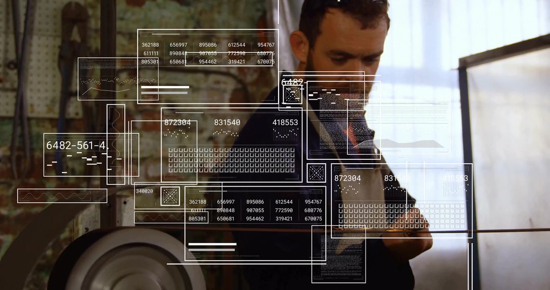 Technician Analyzing Digital Panels in Industrial Workshop