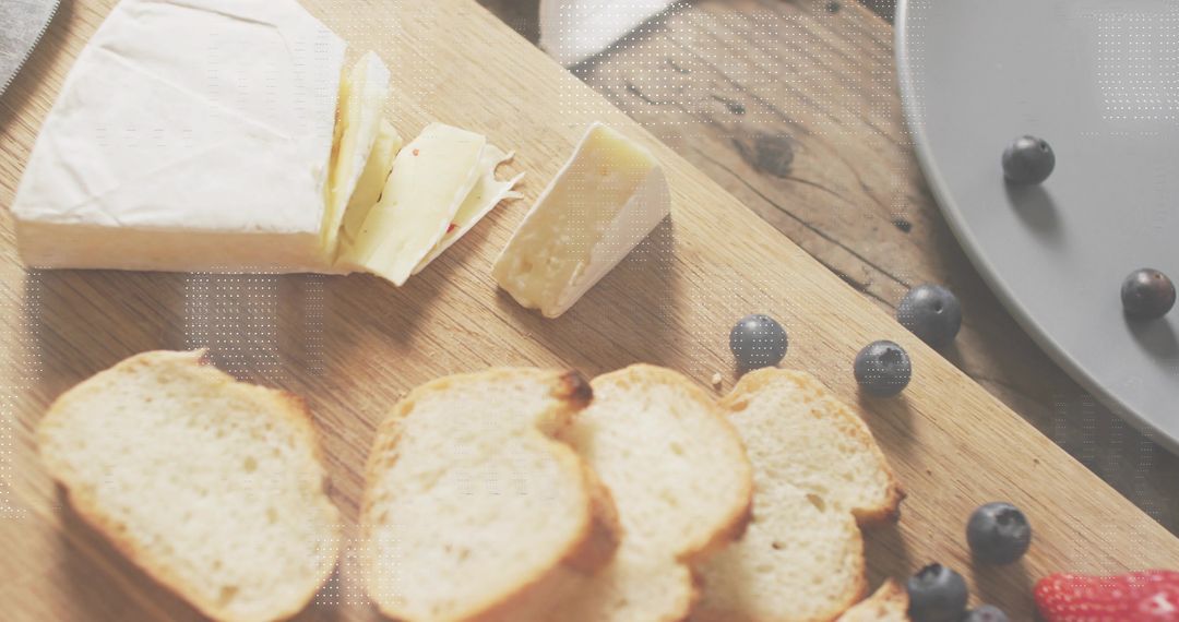Brie Wedge Resting on Rustic Wooden Cutting Board with Toasted Crostini and Blueberries