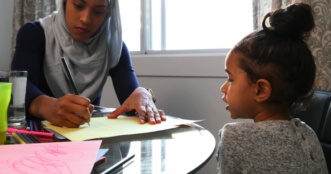 Mother and Daughter Bonding During Art Projects at Home