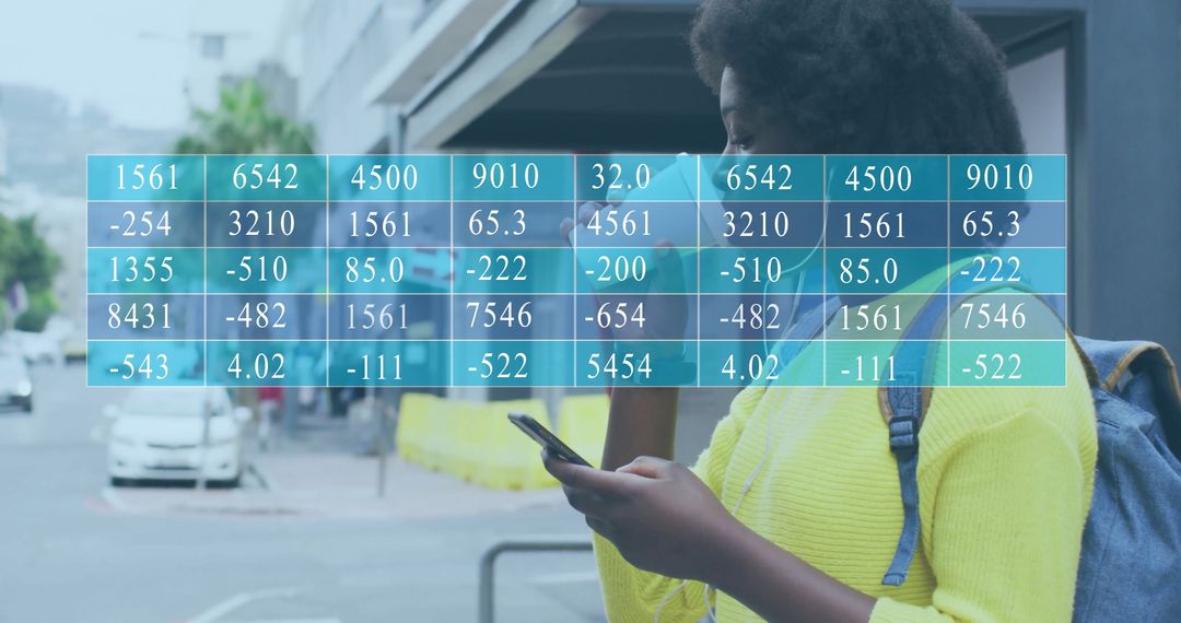 Woman Reviewing Data on Smartphone in Urban Environment