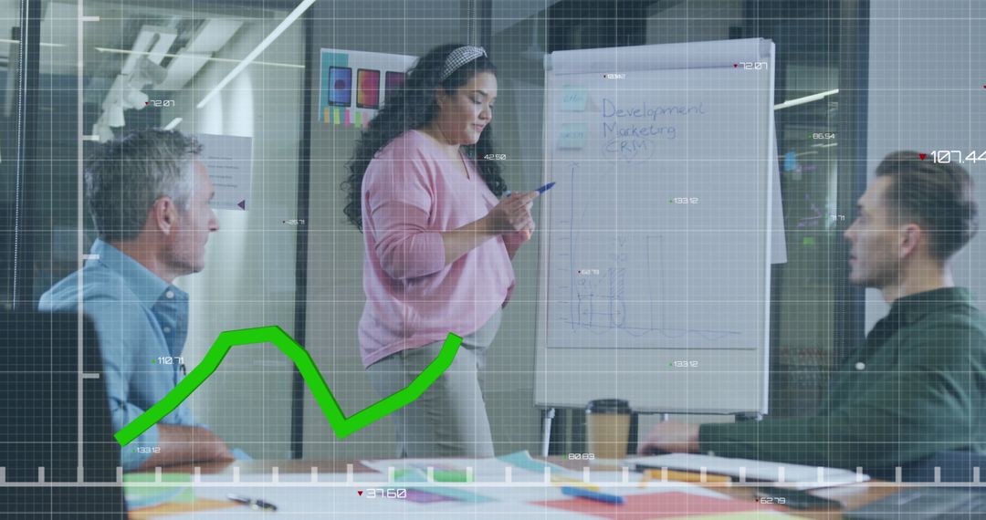 Diverse Team Collaborating with Data Analytics in Modern Office