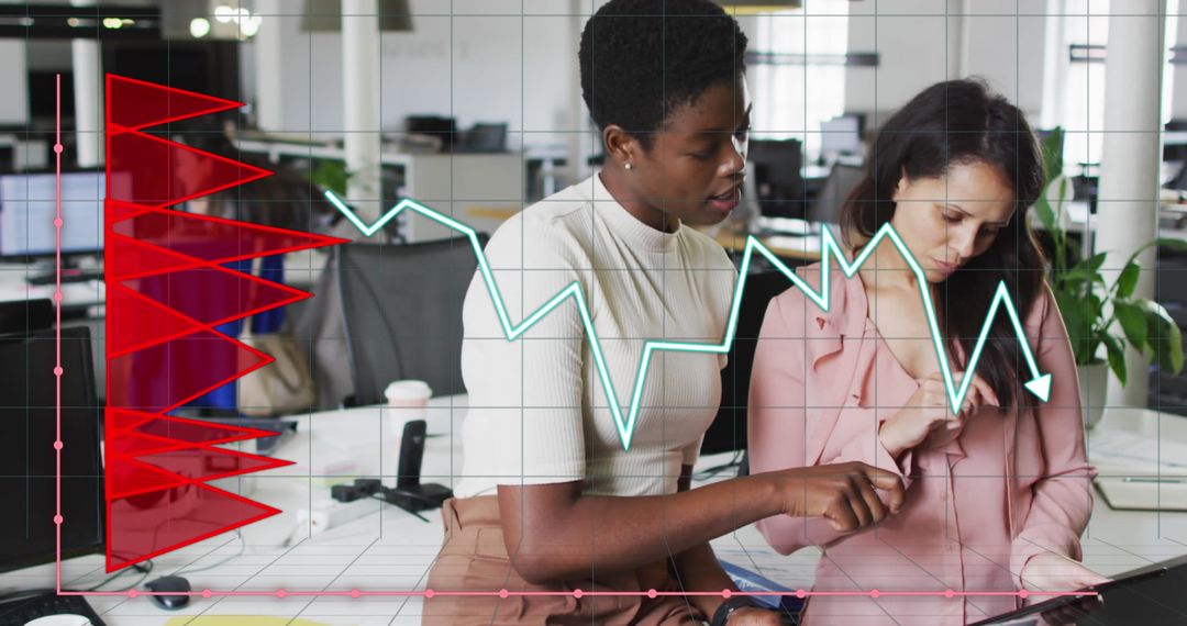 Diverse Team Analyzing Digital Data Trends in Modern Office