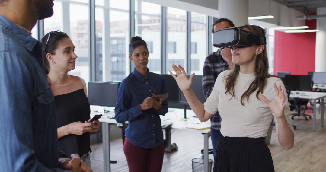 Diverse group of business colleagues using vr headset during meeting - Free Images, Stock Photos and Pictures on Pikwizard.com