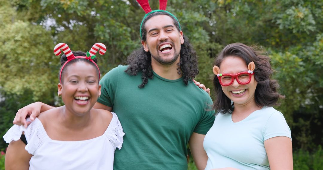 Festive Friends Joyfully Embracing in Sunny Park