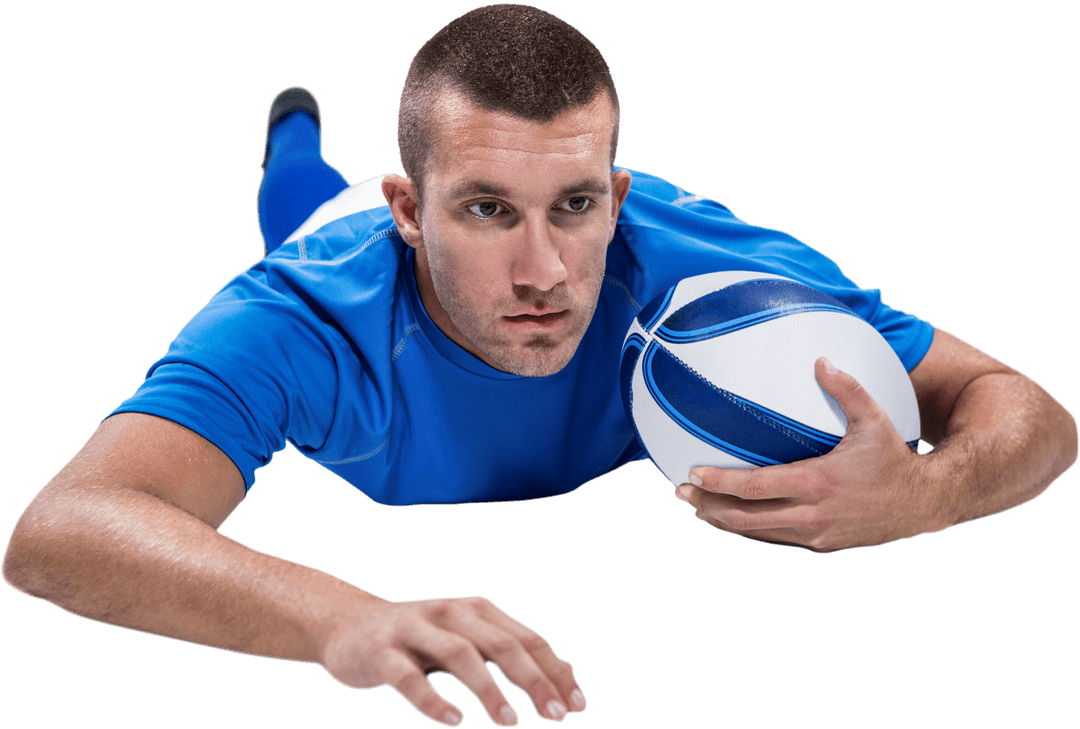 Rugby Player Focused Lying on Ground with Ball Transparent Background