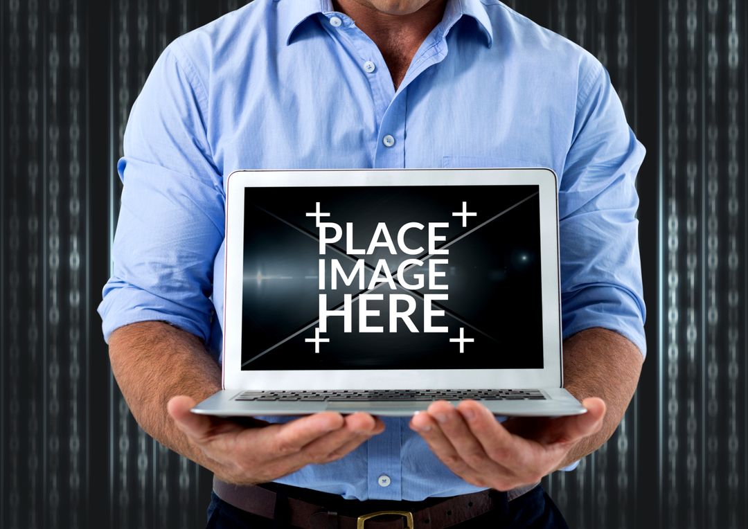 Businessman displaying laptop screen for digital customization