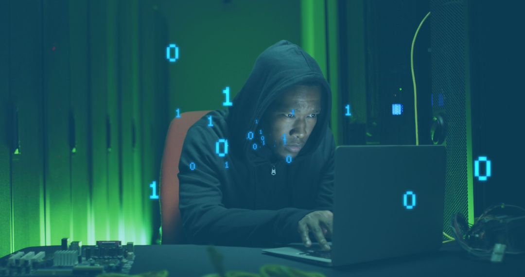 Image of binary coding against african american male hacker using laptop at computer server room - Free Images, Stock Photos and Pictures on Pikwizard.com