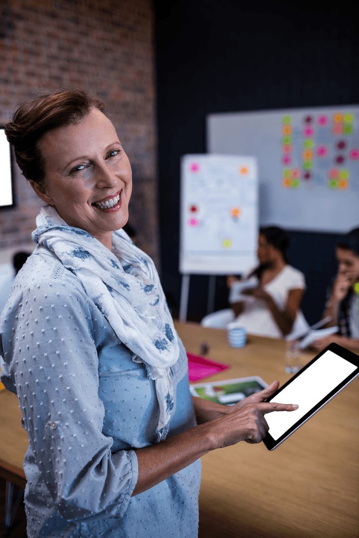 Confident Woman Using Transparent Tablet in Modern Office