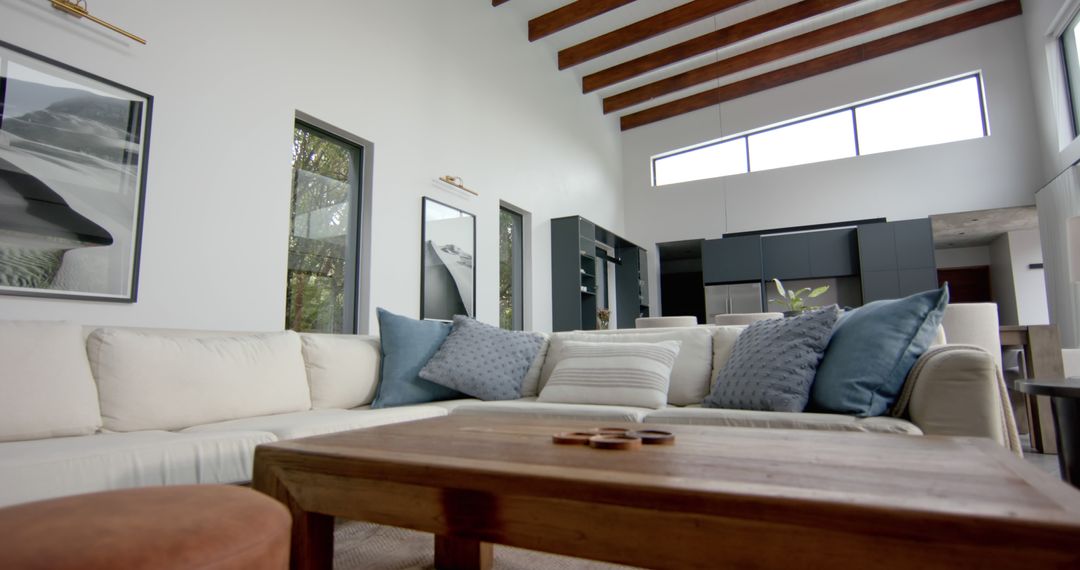 Modern Living Room Interior with Stylish Furniture and Wooden Beams - Free Images, Stock Photos and Pictures on Pikwizard.com