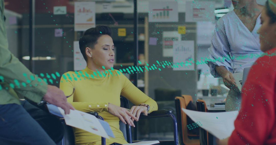 Innovative Business Team Analyzing Financial Data in Modern Office