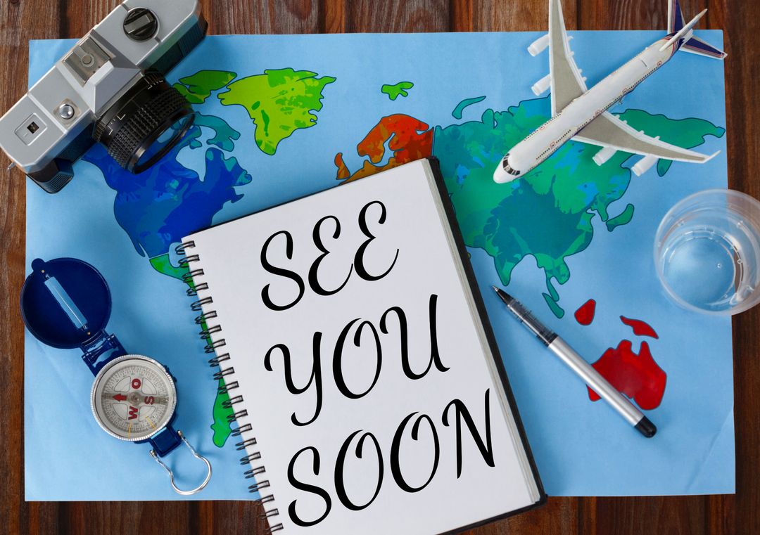 Travel Planning Farewell Concept with Notebook on Map