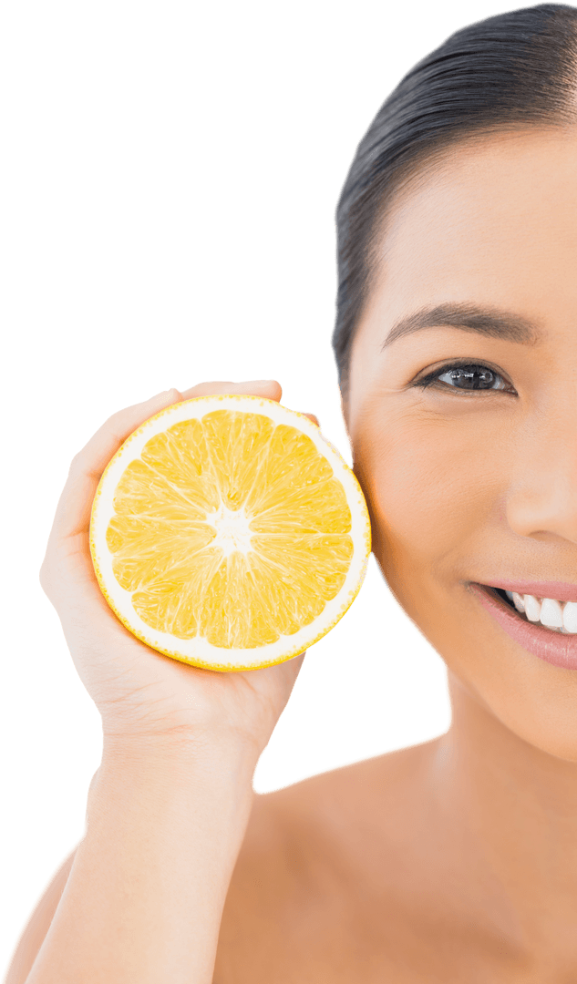 Smiling Woman Holding Orange Slice Near Face on Transparent Background