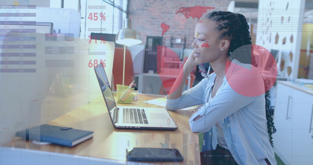 African American Businesswoman Analyzing Financial Data With Digital Overlay