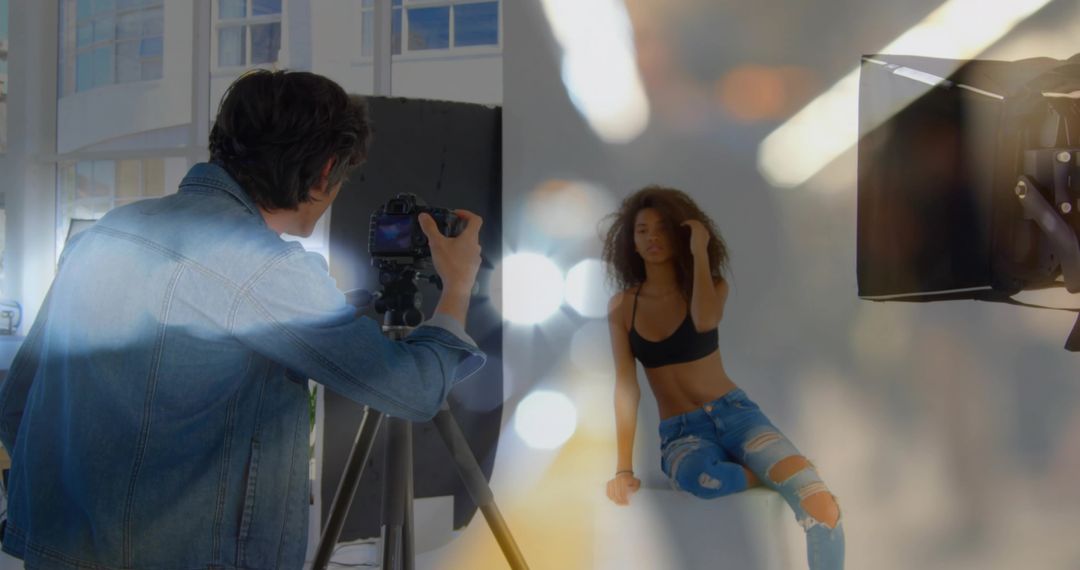Photographer Capturing Model in Studio with Professional Lighting
