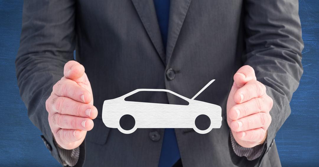 Businessman Holding Car Symbol Representing Auto Industry - Free Images, Stock Photos and Pictures on Pikwizard.com