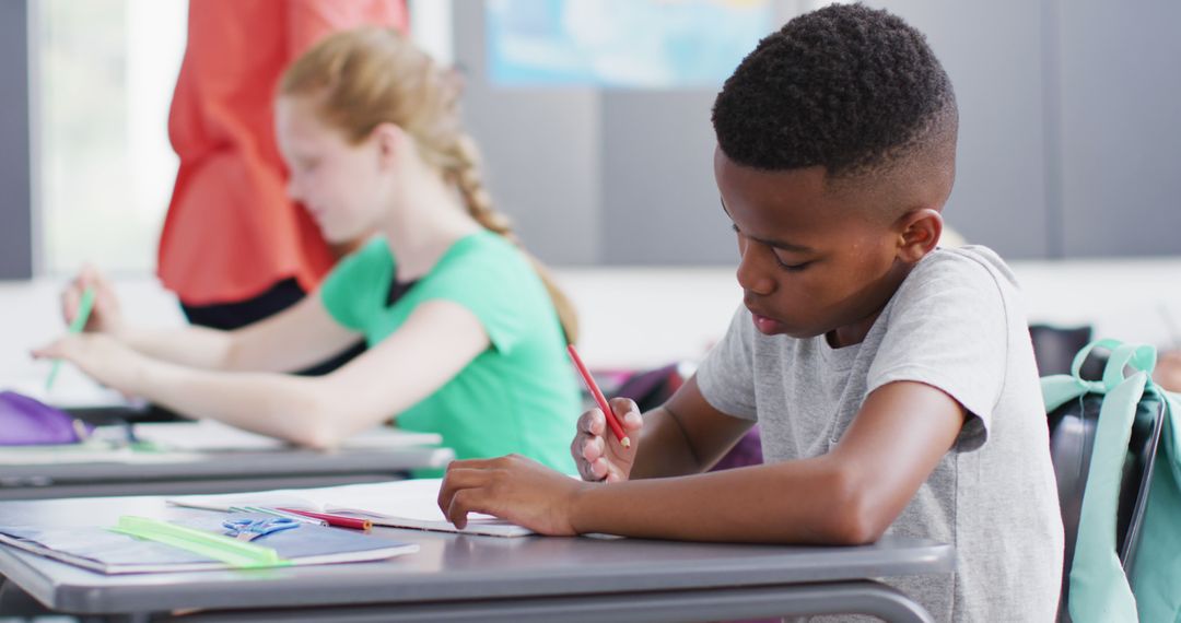 Focused Students Working Diligently in Classroom