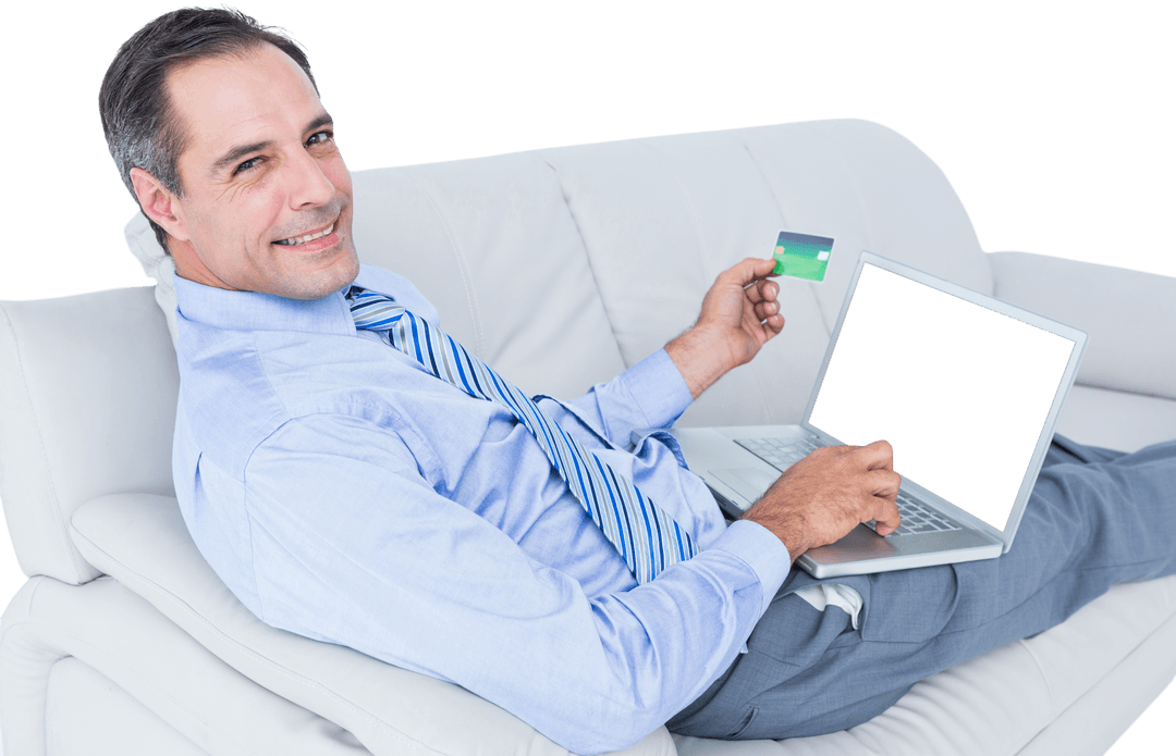 Smiling Businessman with Credit Card and Laptop on Transparent, Comfortable Sofa
