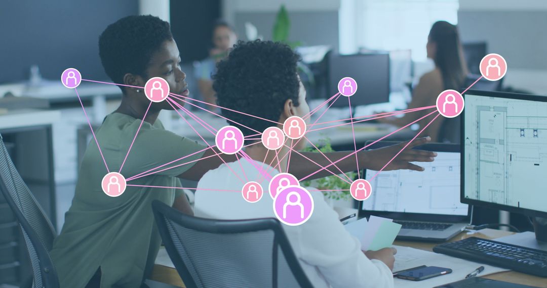 Colleagues Discussing with Digital Network Connections in Office Setting