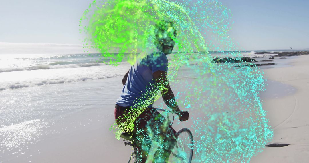 Dynamic Cyclist on Beach with Shimmering Particle Effects