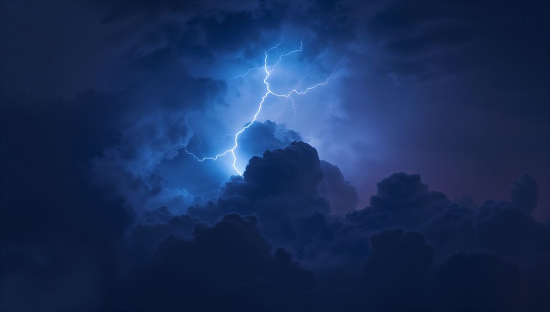 Dramatic Lightning Illuminating Night Sky and Clouds