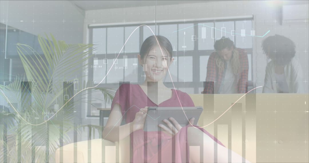 Asian Businesswoman Analyzing Data with Tablet and Team Discussion