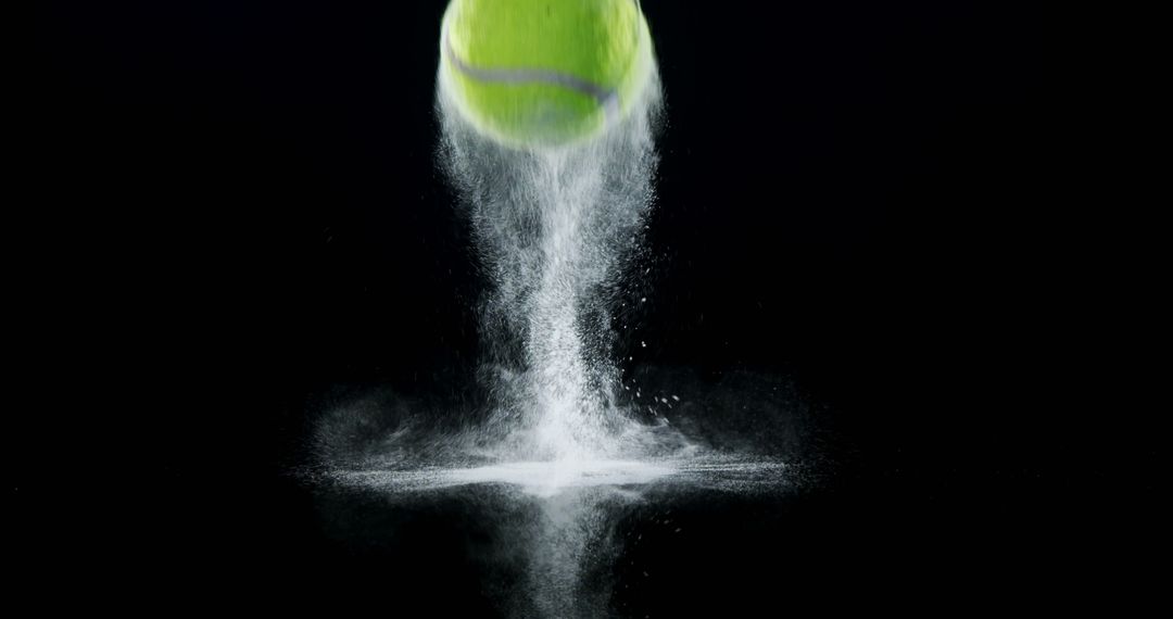 Close-up of bouncing ball with powder against black background 4k - Free Images, Stock Photos and Pictures on Pikwizard.com