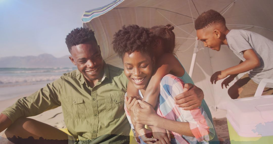 Joyful Family Relaxing at Sunny Beach with Sun Umbrella