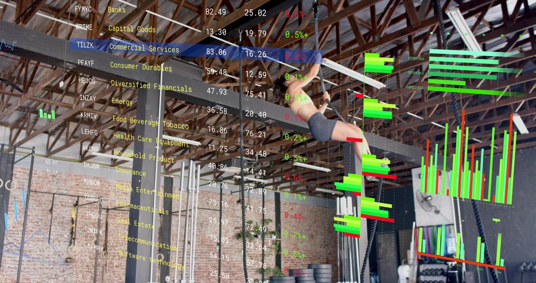 Athlete Hanging from Metal Rig Gripping Bar with Stock Market Data Overlay in Loft Gym