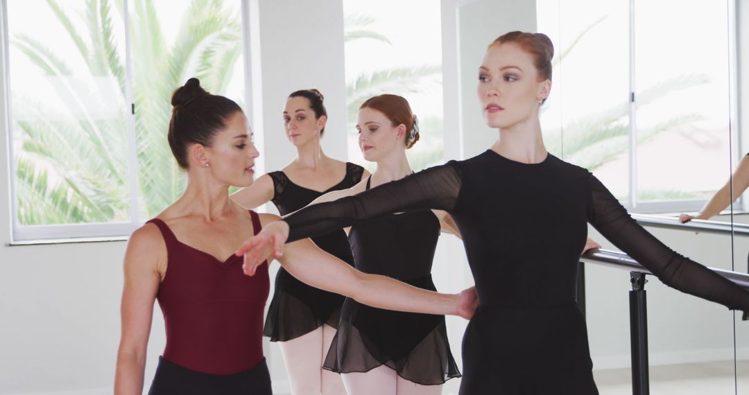 Ballet Instructor Training Group of Female Dancers in Dance Studio - Free Images, Stock Photos and Pictures on Pikwizard.com