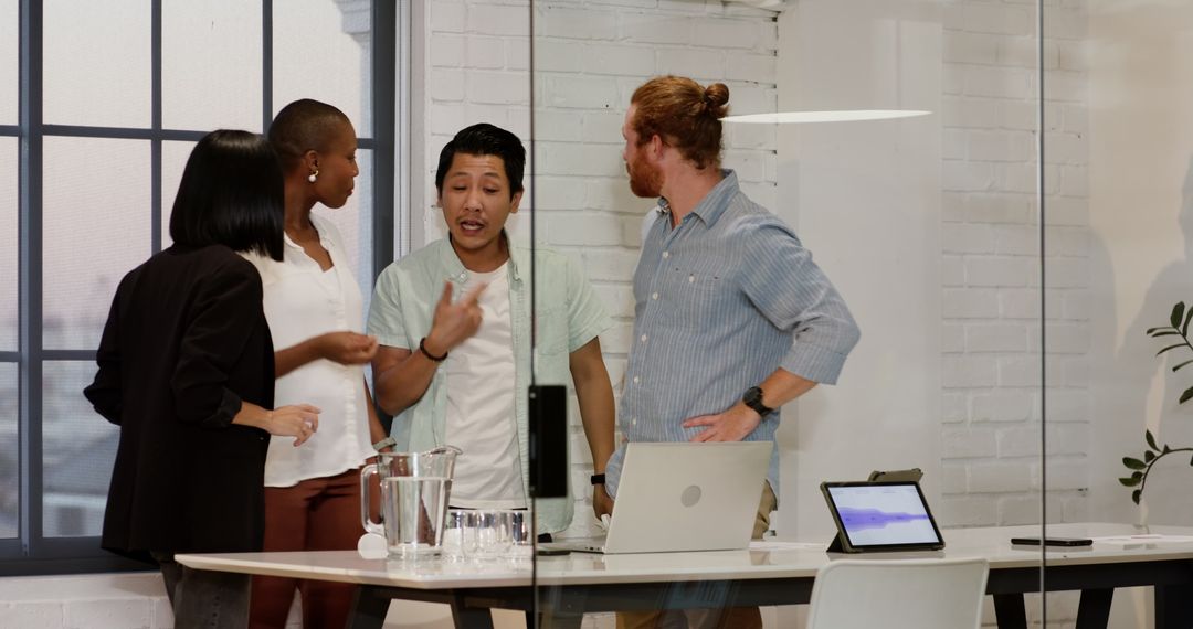 Diverse Team Brainstorming Project in Modern Office